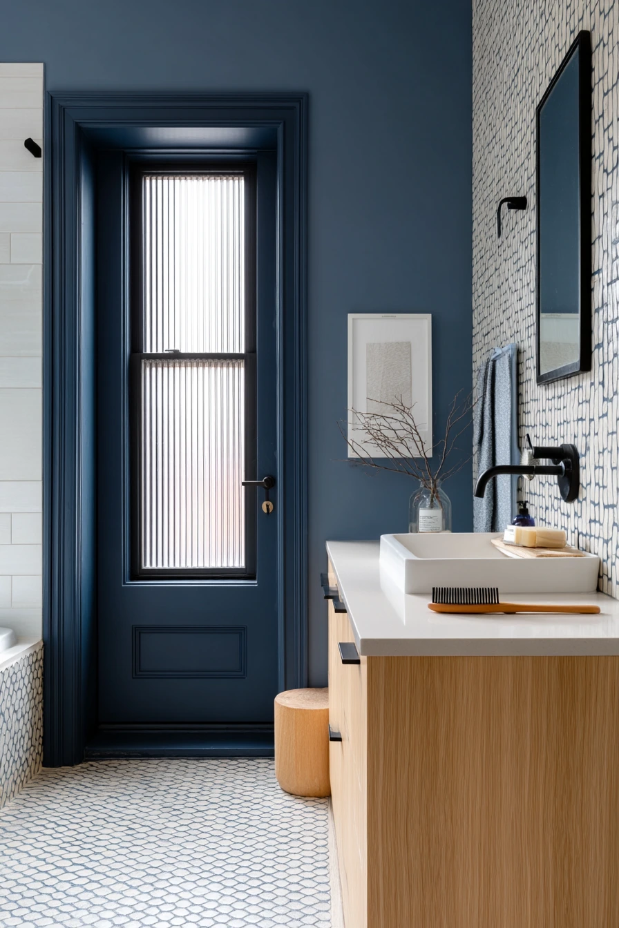 Graphic Tile-Backed Door for a Renovated Hall Bath