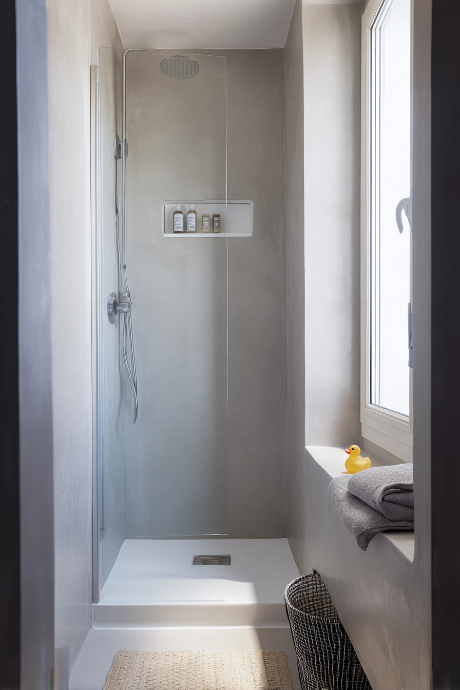 Small Apartment Concrete Shower Nook