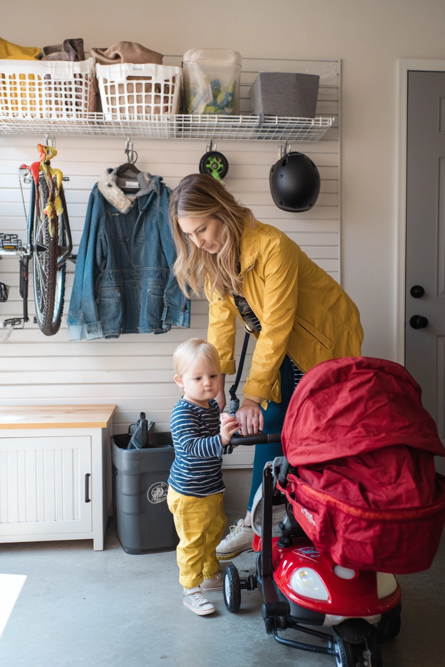 Bike-and-stroller wall storage in a young family garage
